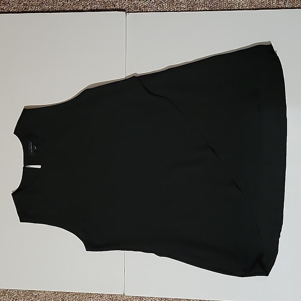 *The Limited elegant black crepe top in size S.